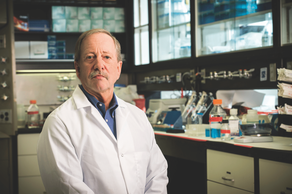 Portrait of Steven N. Austad in a lab.