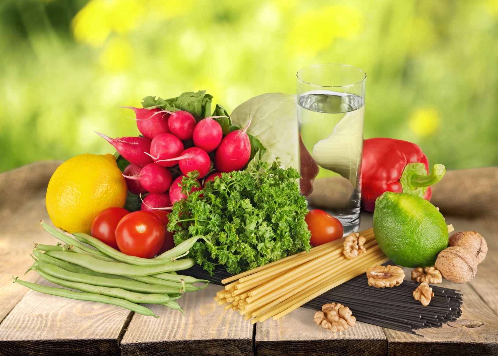 Healthy foods and a glass of water.