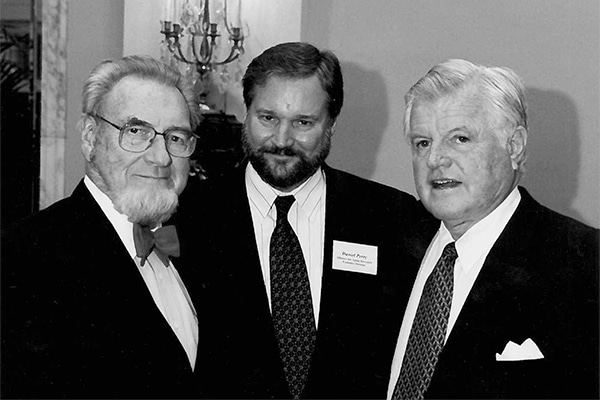 Historical photo of Dan Perry and C. Everett Koop with another man.