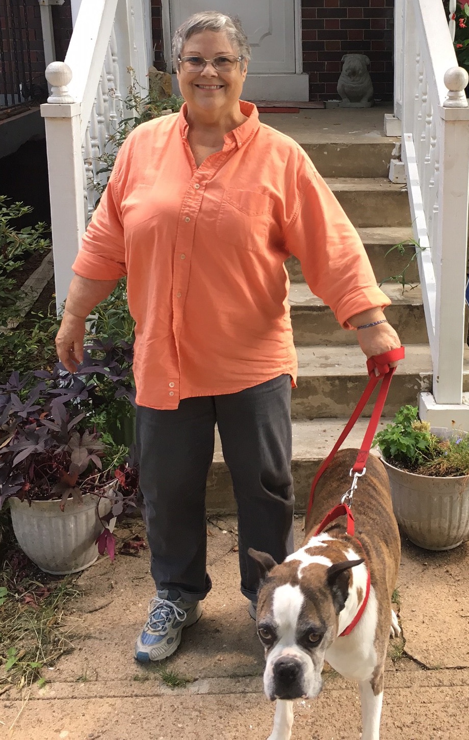 Phyllis Pricer walking her dog.
