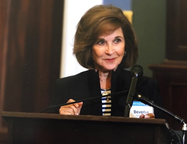 Beverlye Hyman Fead speaking at a podium.