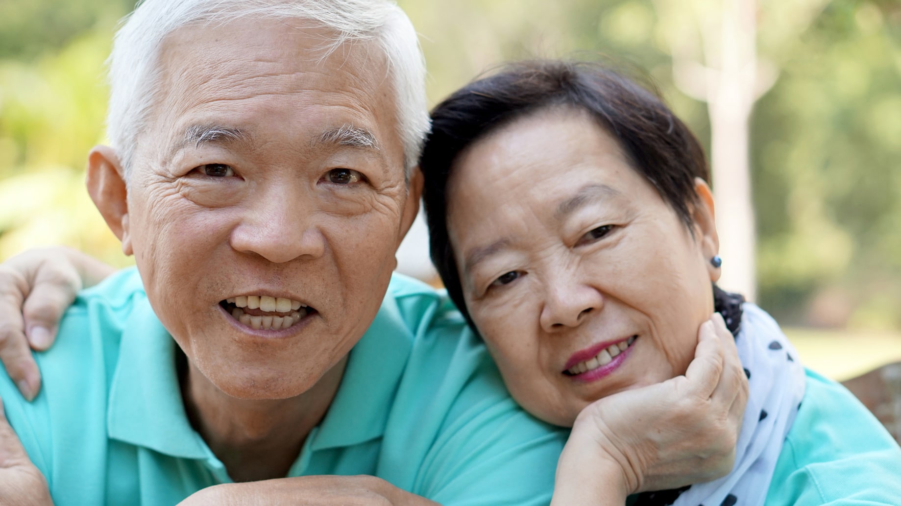 Senior couple smiling.