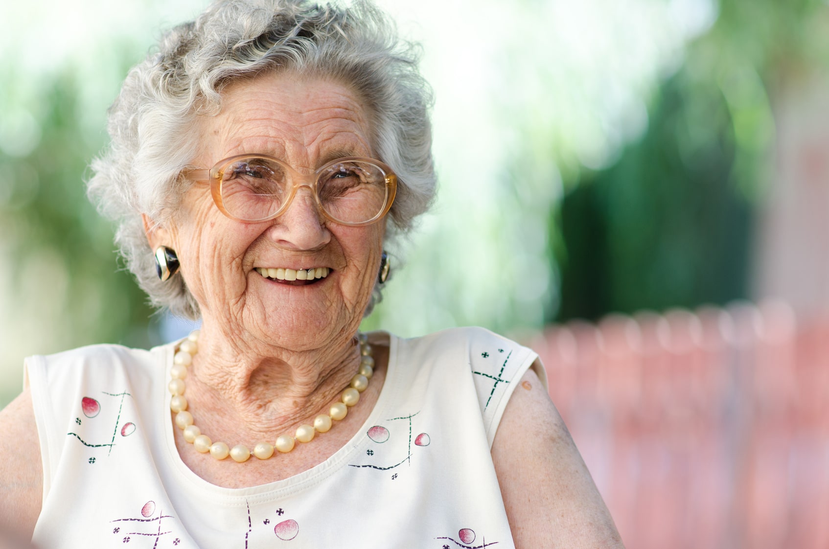 Senior woman smiling.