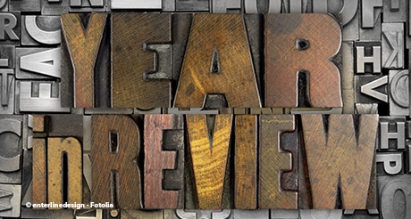 Wooden blocks spelling out "Year in Review."