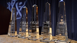 Crystal Alliance for Aging Research trophies.