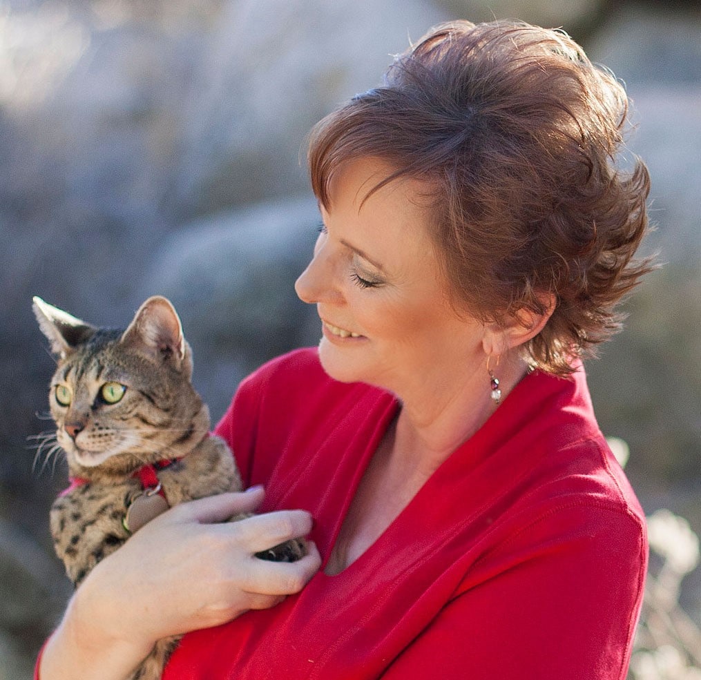 Debbe McCall holding a cat.