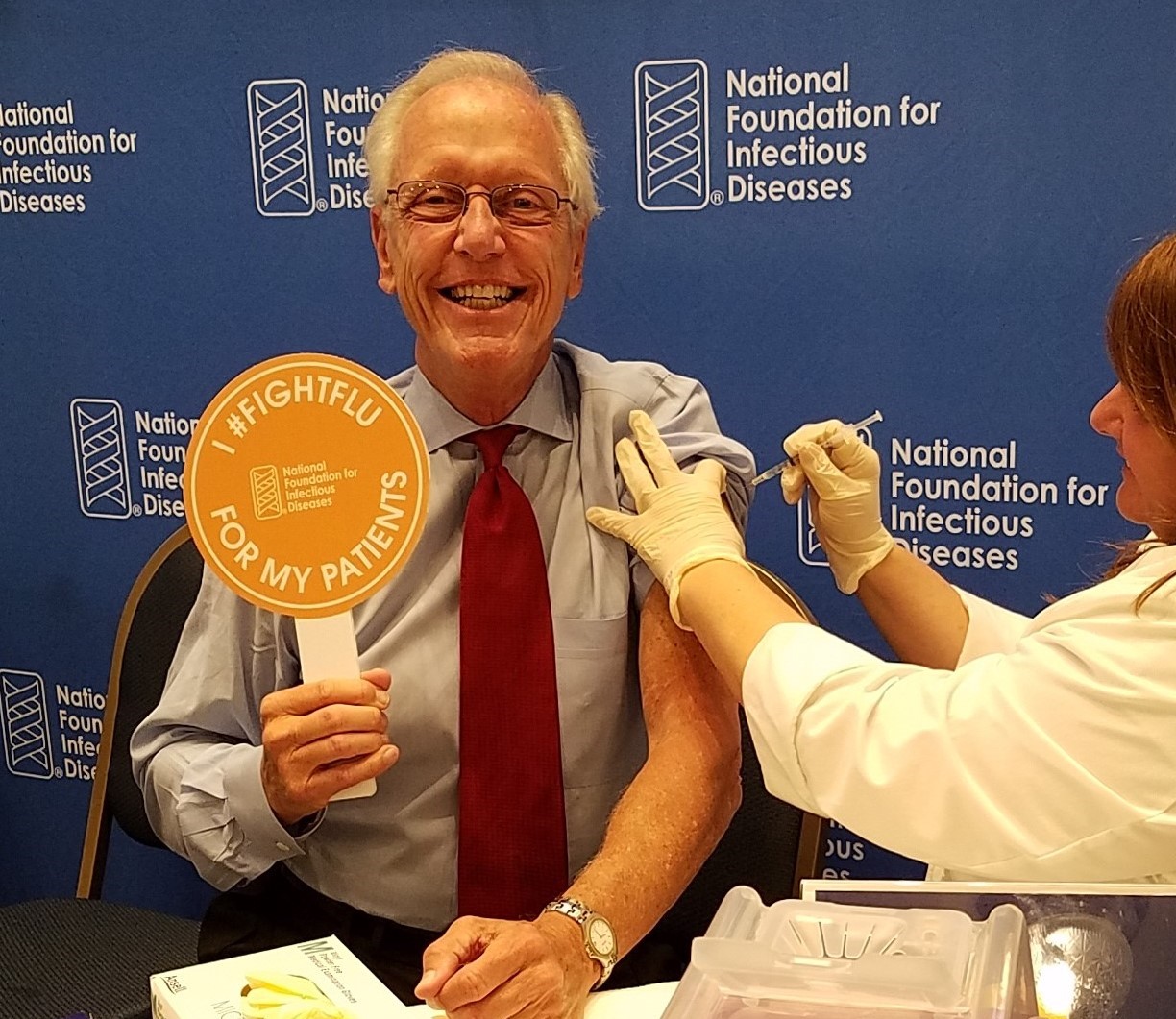 Dr. William Schaffner receiving the flu vaccine.