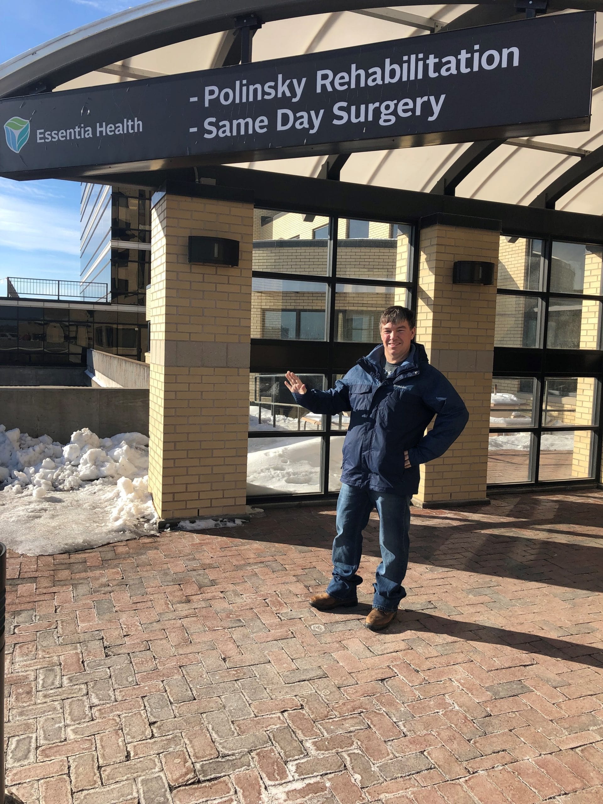 Mike S. standing outside Essentia Health rehabilitation and surgery center.