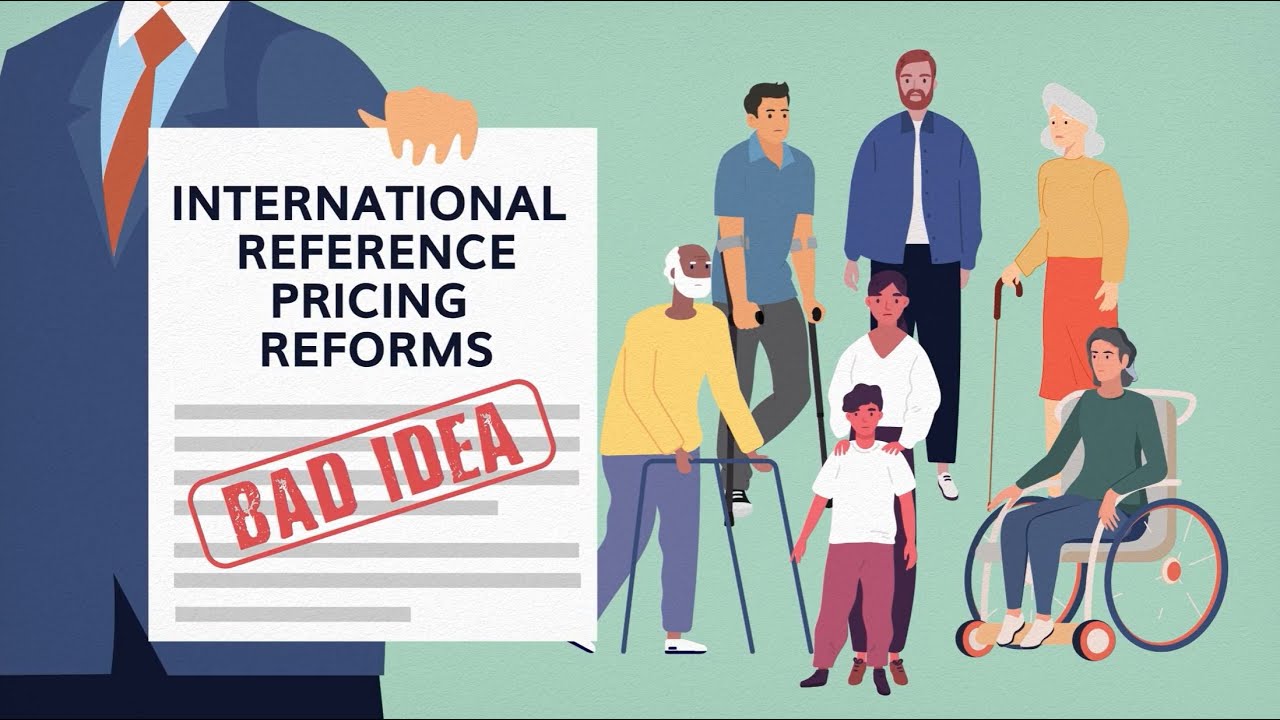 Man holding paper with text "International Reference Pricing Reforms: Bad Idea" with group of disabled people.