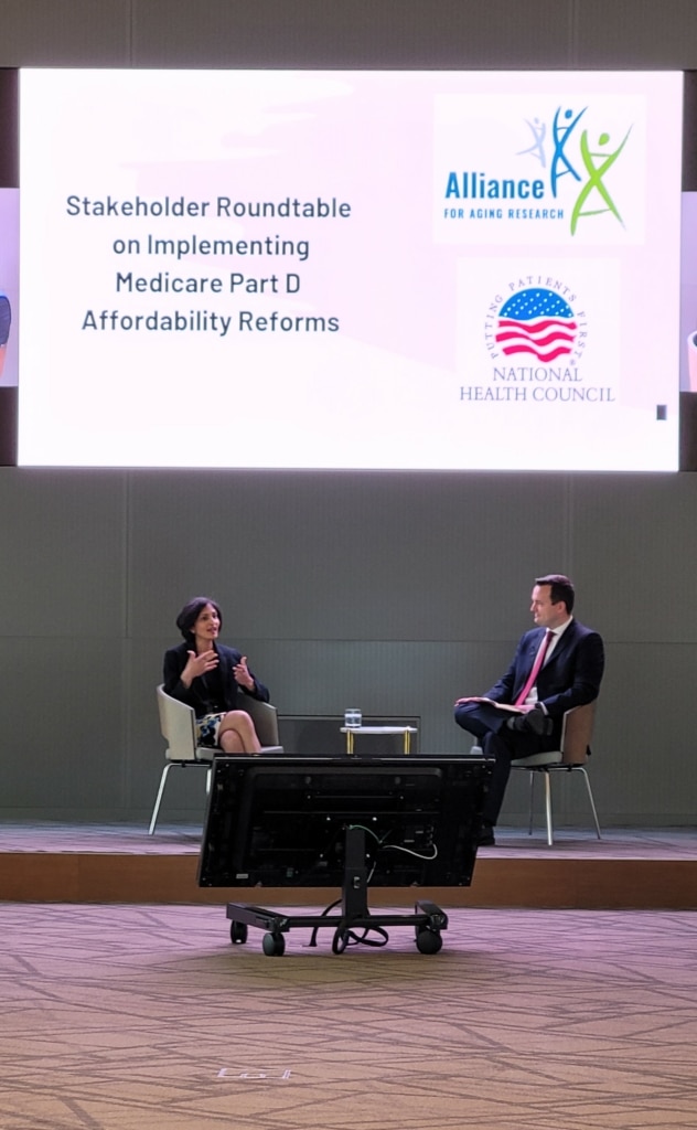 Meena Seshamani and Michael Ward seated on a stage discussing the IRA.