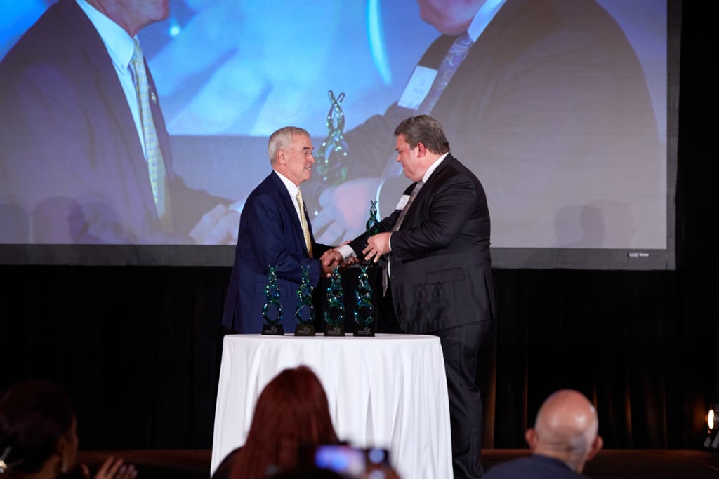 TC Roberge, Head of Federal Government Affairs for Eli Lilly and Company, presents Congressman Brad Wenstrup (R-OH) with the Distinguished Public Service Award.