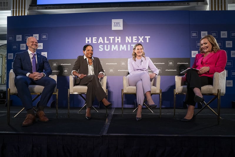 Panel of experts being interviewed on stage