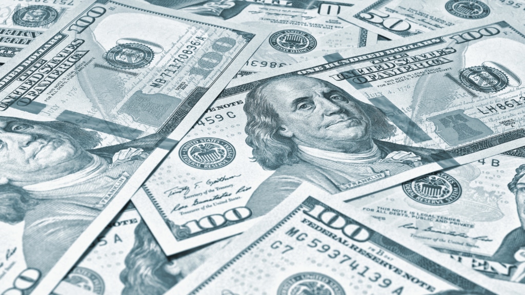 Close-up of several $100 bills
