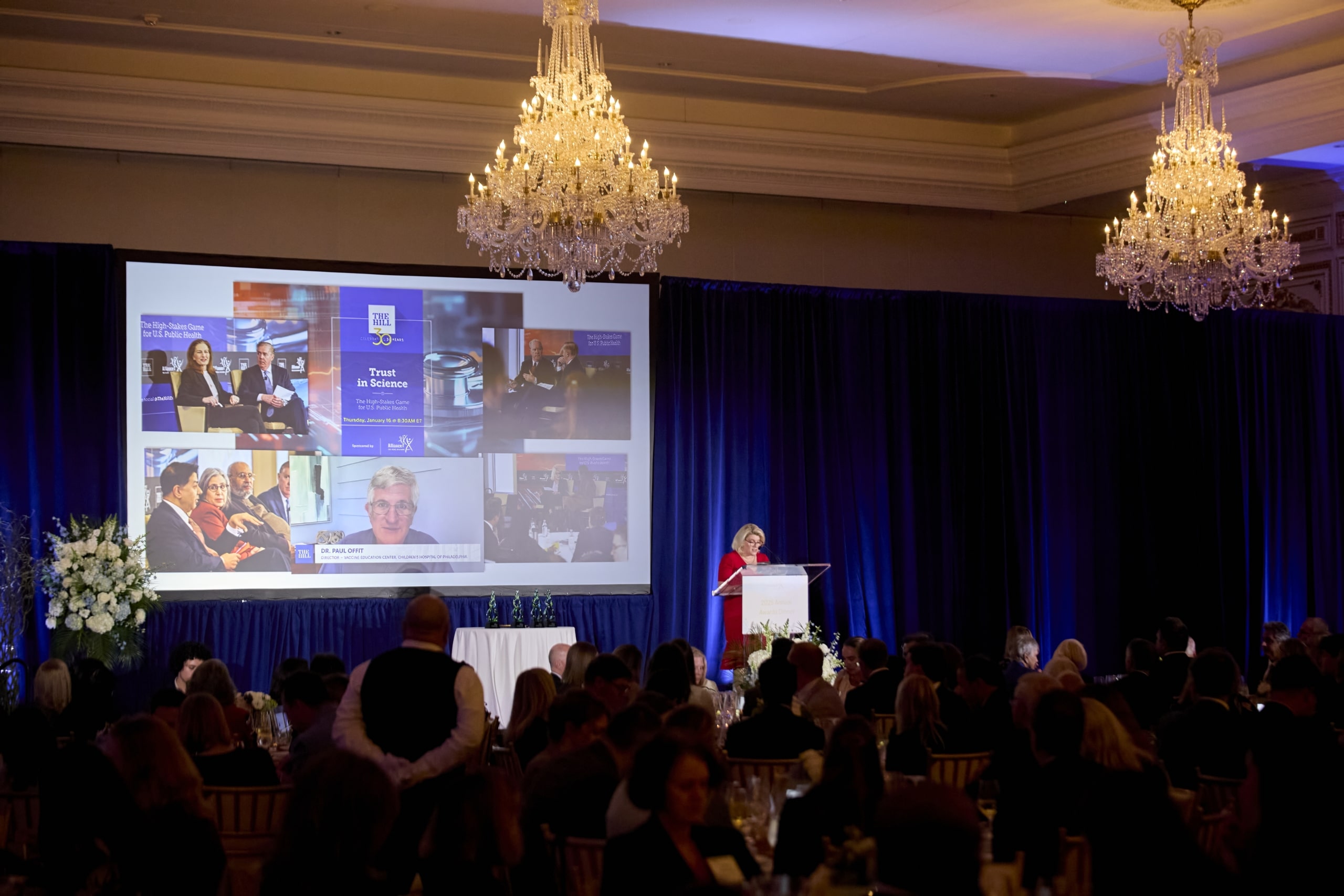 View of large ballroom with speaker up front