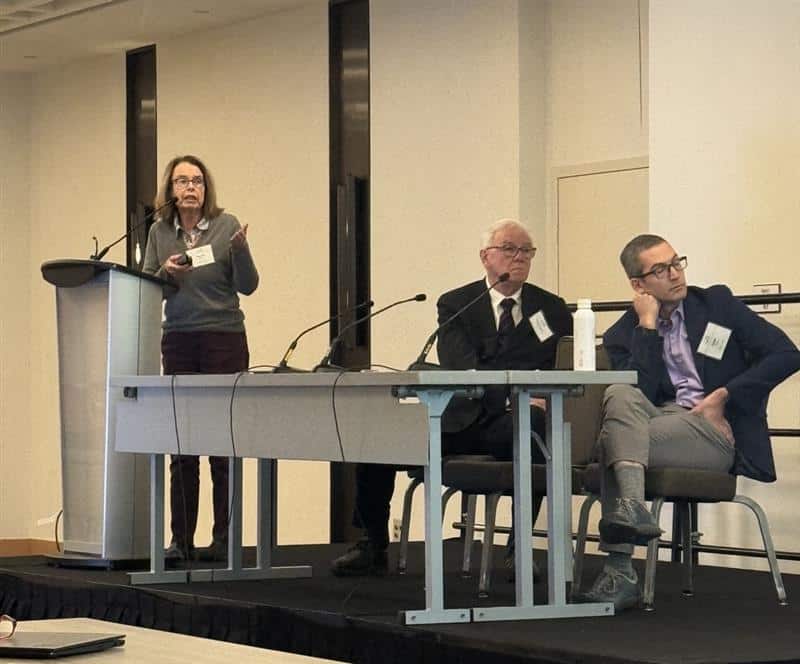 Pamela Maher, Ph.D., Daniel Martin Watterson, Ph.D., and Adam Mecca, M.D., Ph.D. on stage